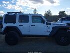 2022 Jeep Wrangler Unlimited High Tide 4x4 Белый vin: 1C4HJXDG9NW253080