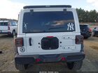 2022 Jeep Wrangler Unlimited High Tide 4x4 Белый vin: 1C4HJXDG9NW253080