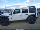 2022 Jeep Wrangler Unlimited High Tide 4x4 Белый vin: 1C4HJXDG9NW253080