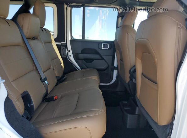 1C4HJXEMXPW593460 2023 JEEP WRANGLER Белый Вид задней части салона
