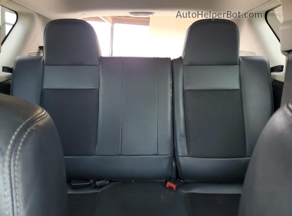 1C4NJCEB6GD664627 2016 JEEP COMPASS Black Vista de los asientos traseros