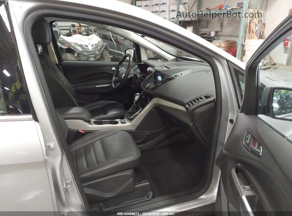 1FADP5CU1GL112572 2016 FORD C-MAX ENERGI Silver Front interior view