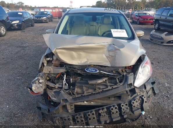 1FADP5CU6GL116519 2016 FORD C-MAX ENERGI Champagne Widok wnętrza z tyłu