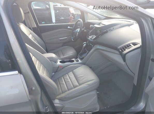 1FADP5CU6GL116519 2016 FORD C-MAX ENERGI Champagne Widok wnętrza z przodu
