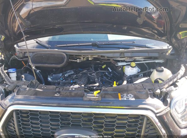 1FBAX9YG1RKB28338 2024 FORD PASSENGER Черный Вид сзади