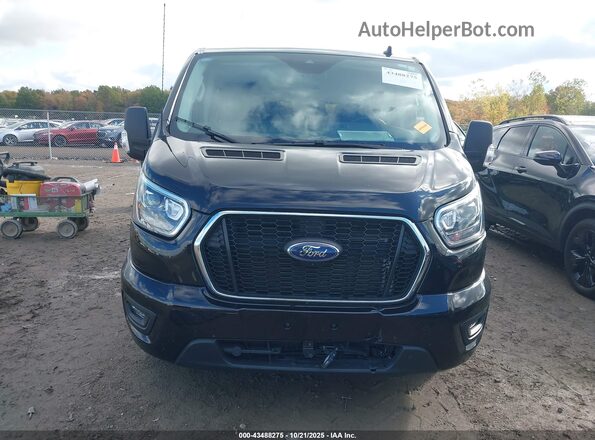 1FBAX9YG1RKB28338 2024 FORD PASSENGER Черный Вид задней части салона