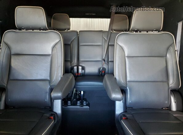1GNSCFKD4PR193723 2023 CHEVROLET SUBURBAN White Vista de los asientos traseros