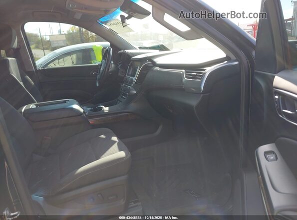 1GNSCGKC9LR264597 2020 CHEVROLET SUBURBAN Черный Вид салона спереди