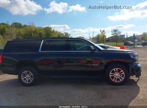 1GNSCGKC9LR264597 2020 CHEVROLET SUBURBAN Черный Вид задней части салона