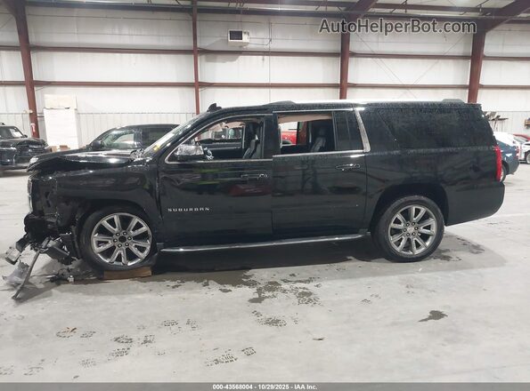 1GNSCJKJ0LR266234 2020 CHEVROLET SUBURBAN Черный Вид задней части салона