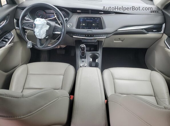 1GYFZDR44NF100839 2022 CADILLAC XT4 Белый Вид панели приборов