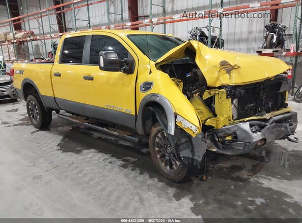 1N6BA1F49GN505079 2016 NISSAN TITAN XD Желтый Передняя правая четверть