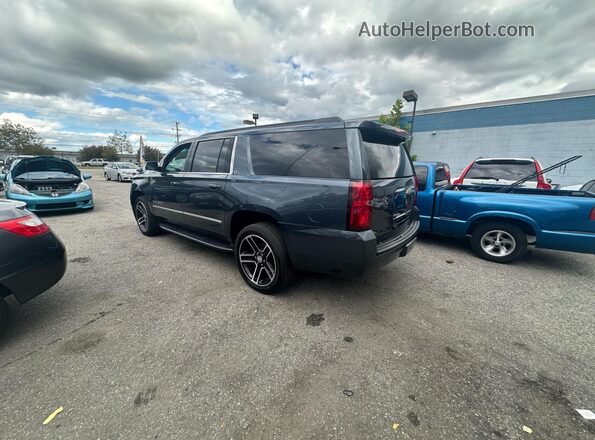 1GNSKHKC1LR245485 2020 CHEVROLET SUBURBAN Серый Передняя правая четверть