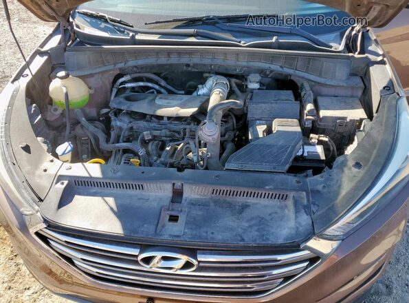 KM8J3CA27GU029538 2016 HYUNDAI TUCSON Коричневый Вид подкапотного пространства