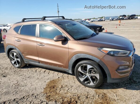 KM8J3CA27GU029538 2016 HYUNDAI TUCSON Коричневый Вид спереди