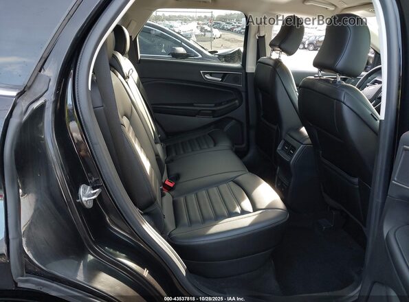2FMPK4J99NBA36302 2022 FORD EDGE Black VIN კოდის სტიკერის ხედი