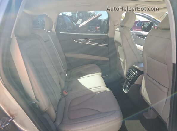 2LMPJ8KP6MBL09027 2021 LINCOLN NAUTILUS Tan Вид задньої частини салону