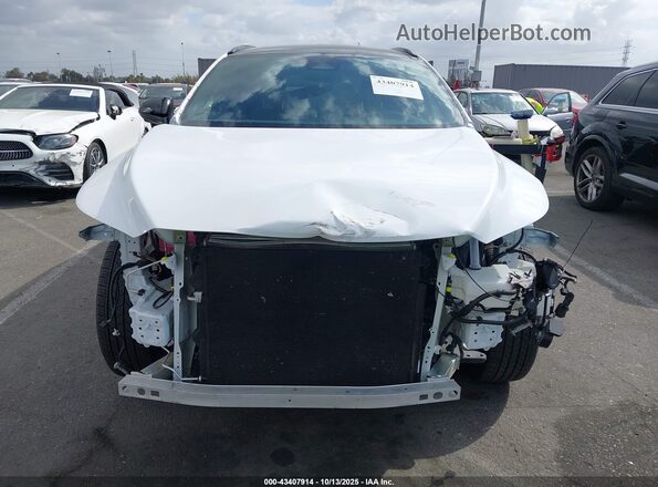 2T2BCMEA8PC007816 2023 LEXUS RX 500H White Widok wnętrza z tyłu