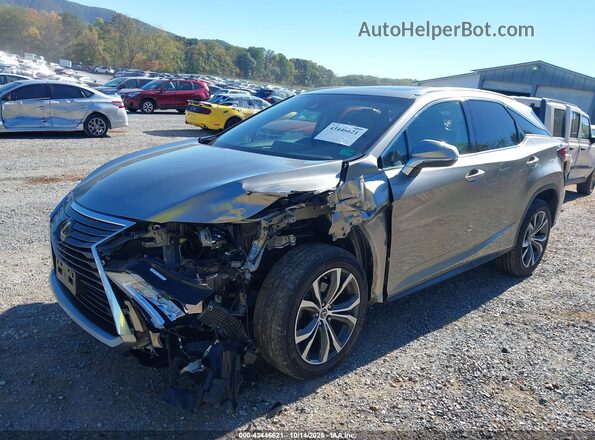 2T2BZMCA3JC151167 2018 LEXUS RX 350 Серебряный Вид спереди