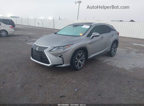 2T2ZZMCA3JC117003 2018 LEXUS RX 350 Silver Vista tres cuartos delantera izquierda