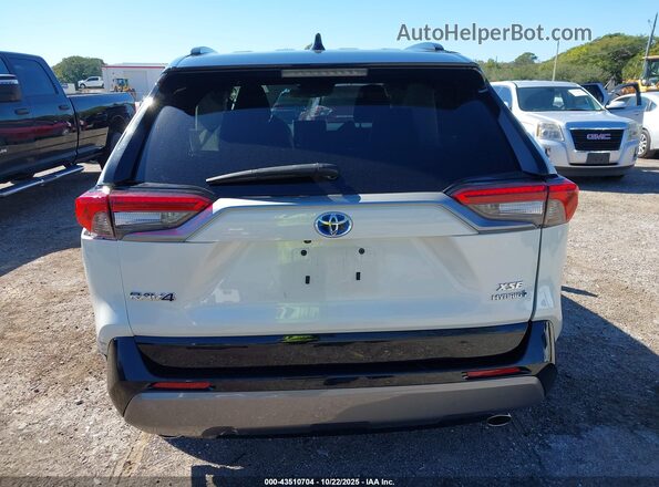 2T3E6RFV2MW016147 2021 TOYOTA RAV4 HYBRID White 
