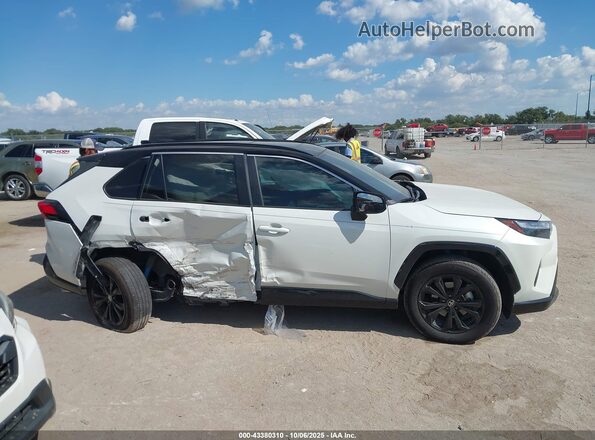 2T3E6RFV2NW035380 2022 TOYOTA RAV4 HYBRID White Սալոնի հետևի տեսք
