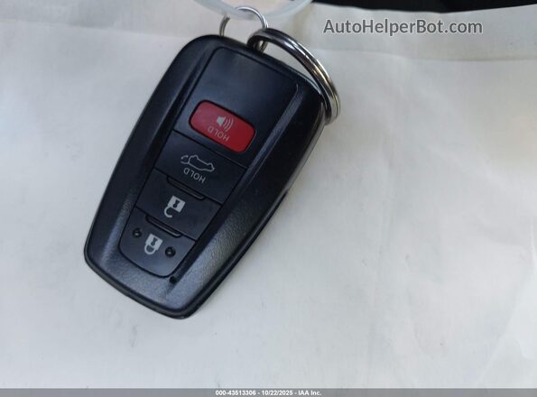 2T3T6RFV5PW044858 2023 TOYOTA RAV4 HYBRID White Вид панелі приладів