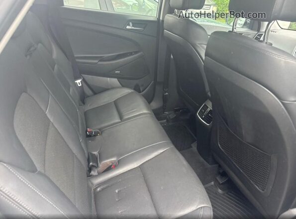 KM8J3CA24GU238767 2016 HYUNDAI TUCSON Silver წინა სალონის ხედი