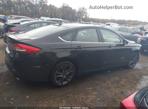 3FA6P0LU0JR248566 2018 FORD FUSION HYBRID Черный Вид задней части салона