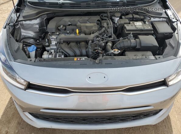 3KPA24AD9PE618748 2023 KIA RIO Серый Вид задней части салона