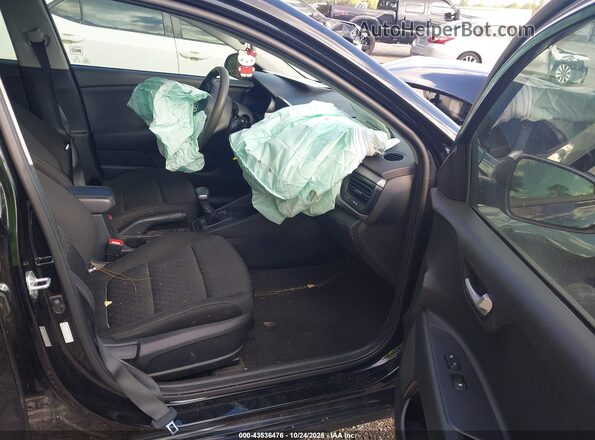 3KPA25AD7ME416556 2021 KIA RIO 5-DOOR Черный Вид салона спереди