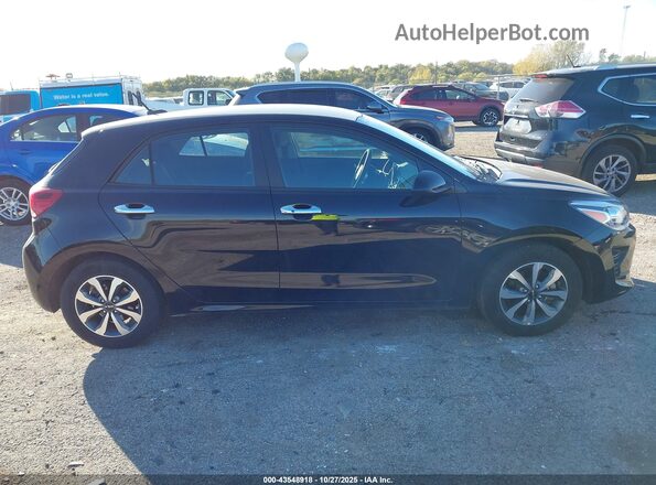 3KPA25AD8PE518162 2023 KIA RIO 5-DOOR Черный Вид задней части салона