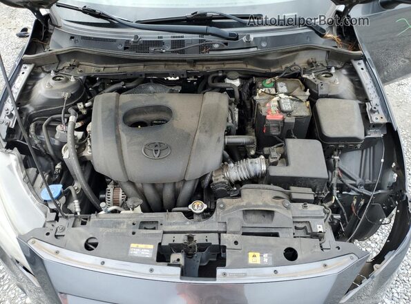 3MYDLBYV0JY302871 2018 TOYOTA YARIS Charcoal Vista interior trasera