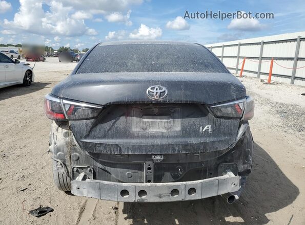 3MYDLBYV2JY320014 2018 TOYOTA YARIS Gray Vista trasera