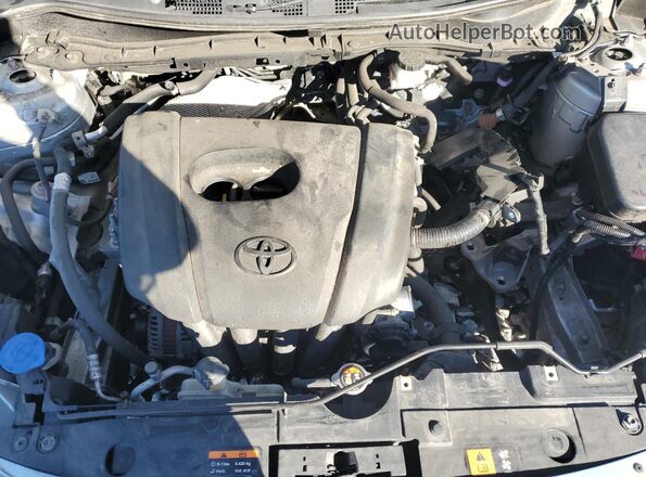 3MYDLBYV2JY326654 2018 TOYOTA YARIS Silver Vista interior trasera