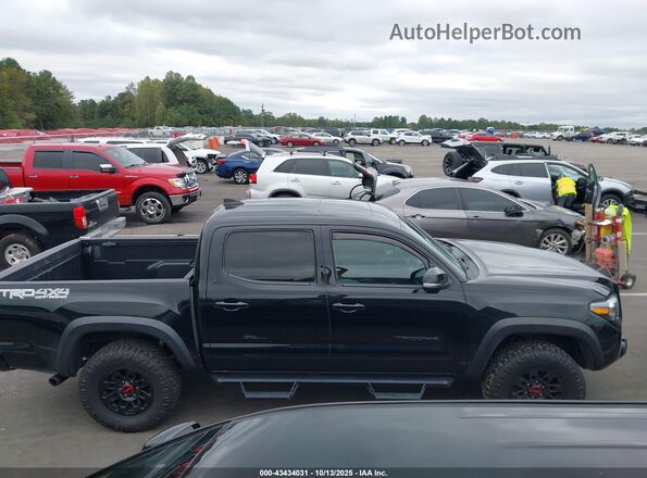 3TMCZ5AN6MM372987 2021 TOYOTA TACOMA Черный Вид задней части салона
