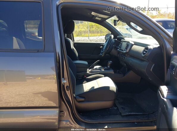 3TYDZ5BN0MT000617 2021 TOYOTA TACOMA Gray Front interior view