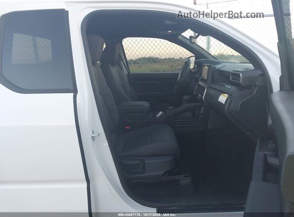 3TYJDAKN7ST020337 2025 TOYOTA TACOMA Белый Вид салона спереди