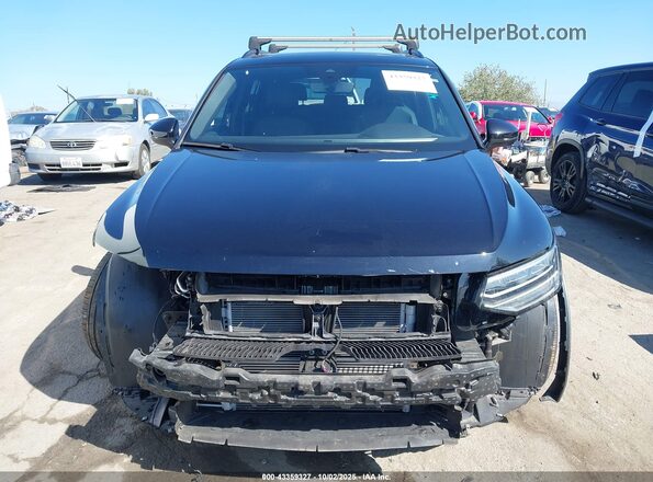 3VVCB7AX2RM024405 2024 VOLKSWAGEN TIGUAN Черный Вид задней части салона