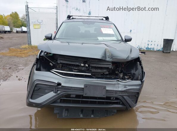 3VVFB7AX8PM022233 2023 VOLKSWAGEN TIGUAN Gray Vista interior trasera