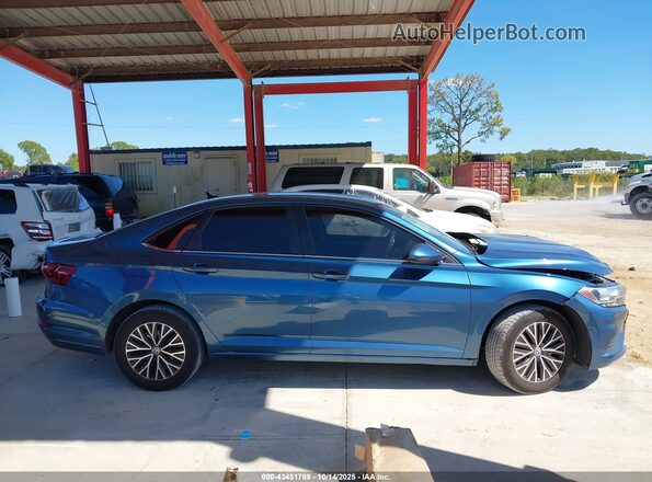 3VWC57BU0MM038044 2021 VOLKSWAGEN JETTA Синий Вид задней части салона