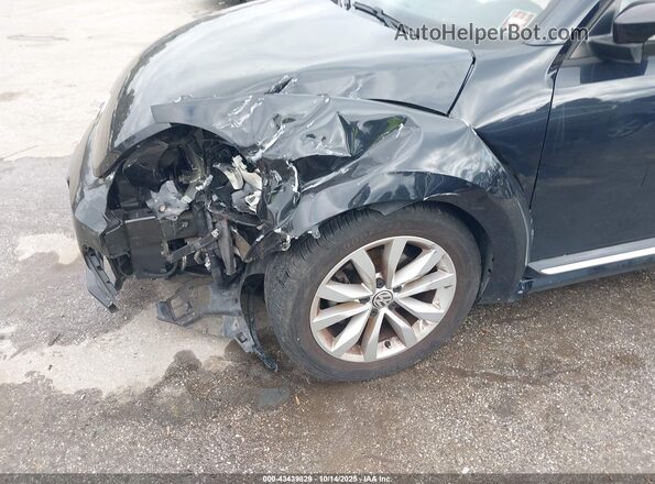 3VWF17AT5HM630840 2017 VOLKSWAGEN BEETLE Черный Вид спереди