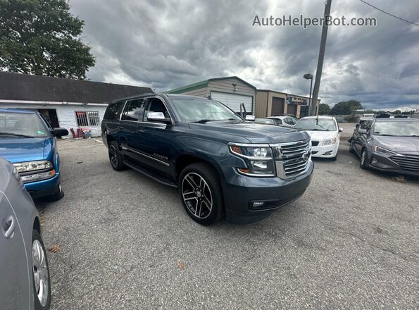 1GNSKHKC1LR245485 2020 CHEVROLET SUBURBAN Серый Задняя левая четверть