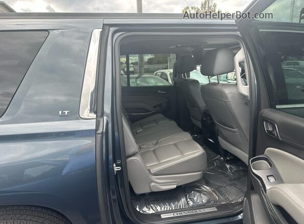 1GNSKHKC1LR245485 2020 CHEVROLET SUBURBAN Серый Вид салона спереди
