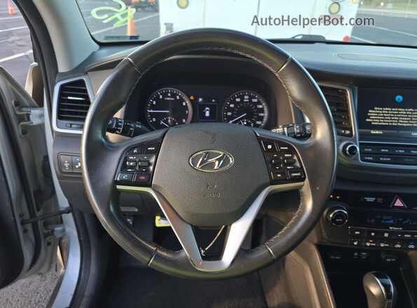 KM8J3CA24GU238767 2016 HYUNDAI TUCSON Silver უკანა სავარძლების ხედი