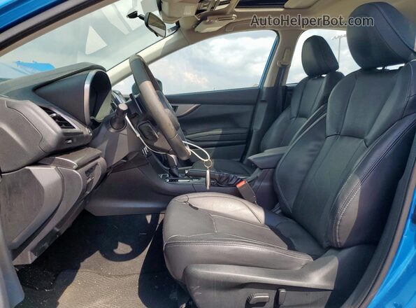 4S3GKAU68M3605322 2021 SUBARU IMPREZA Blue Vista interior delantera