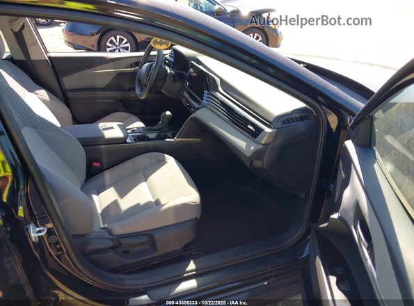 4T1DAACK4SU564713 2025 TOYOTA LE Черный Вид салона спереди
