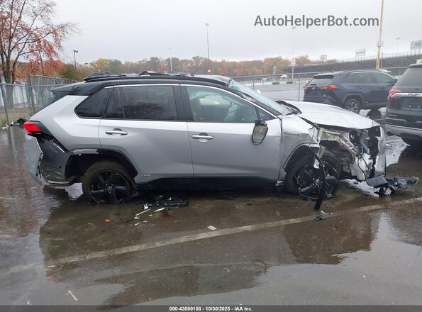 4T3E6RFV1MU059801 2021 TOYOTA RAV4 HYBRID Gray Vista interior trasera