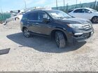 2018 Honda Pilot Touring Черный vin: 5FNYF6H95JB052993