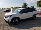 2023 Honda Passport Touring White vin: 5FNYF8H94PB501827